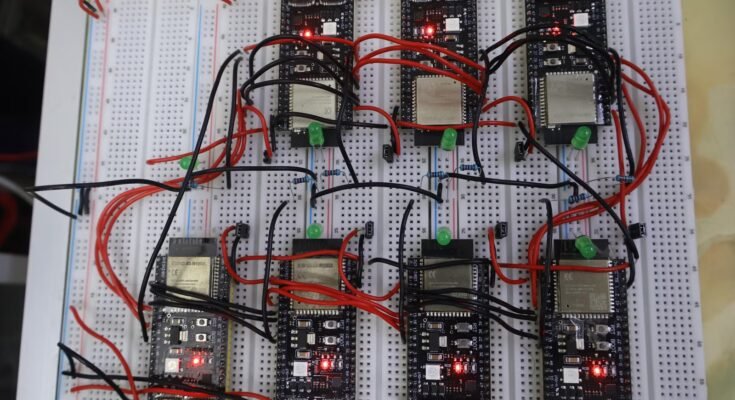 Someone wired up seven ESP32s to make ~0.4B LLM, you can too